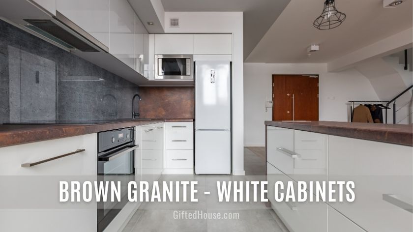 White Cabinets with brown granite countertop